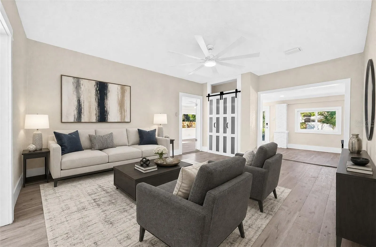 The spacious Living Room provides a comfortable gathering space. Virtually Staged