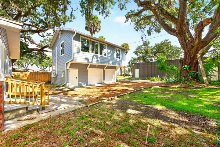 The 2-car garage and separate Guest Residence.