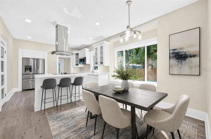 A large picture window in the Dining Room fills the space with NATURAL LIGHT. Virtually Staged