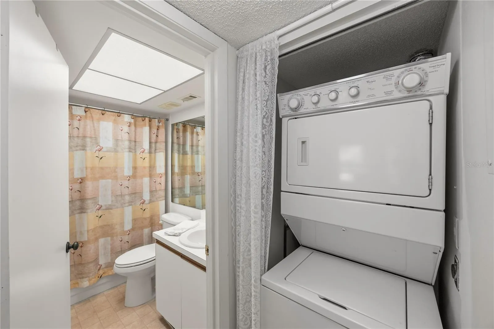 Secondary Bathroom and Laundry Area