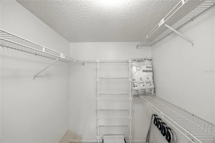 Primary Bedroom Walk-in Closet