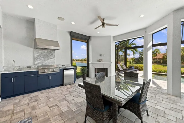 Outdoor Kitchen and Dining with a Fireplace