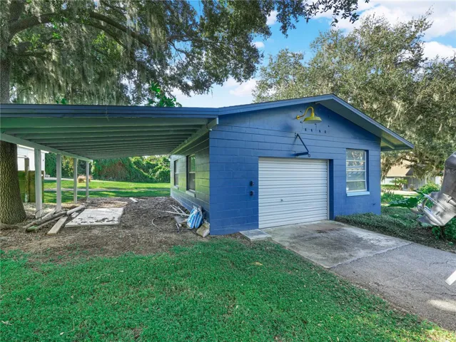 Detached Garage/Work shop with additional covered area