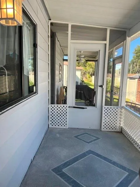 Two covered Screened in porches located at back of home
