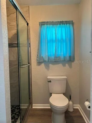 Glass Shower Doors to Tiled shower