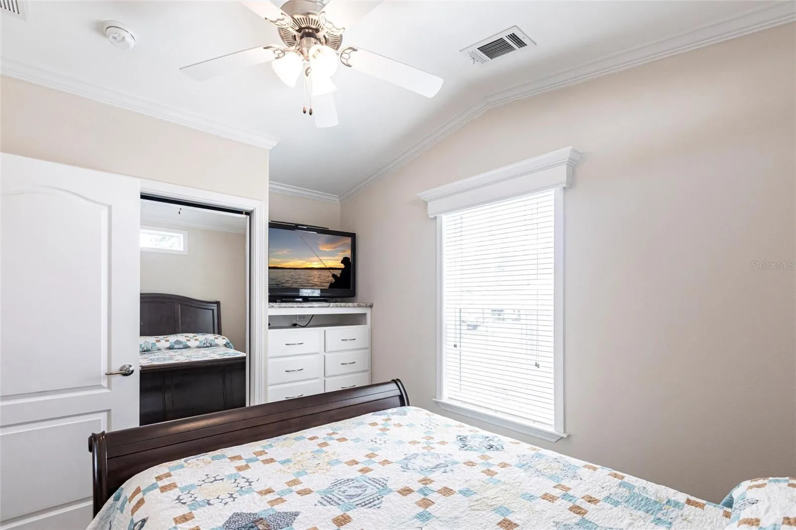 Bedroom built in dresser and sliding closet doors