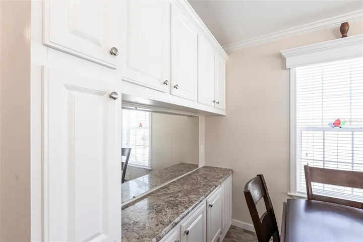 Added cabinets dry bar area