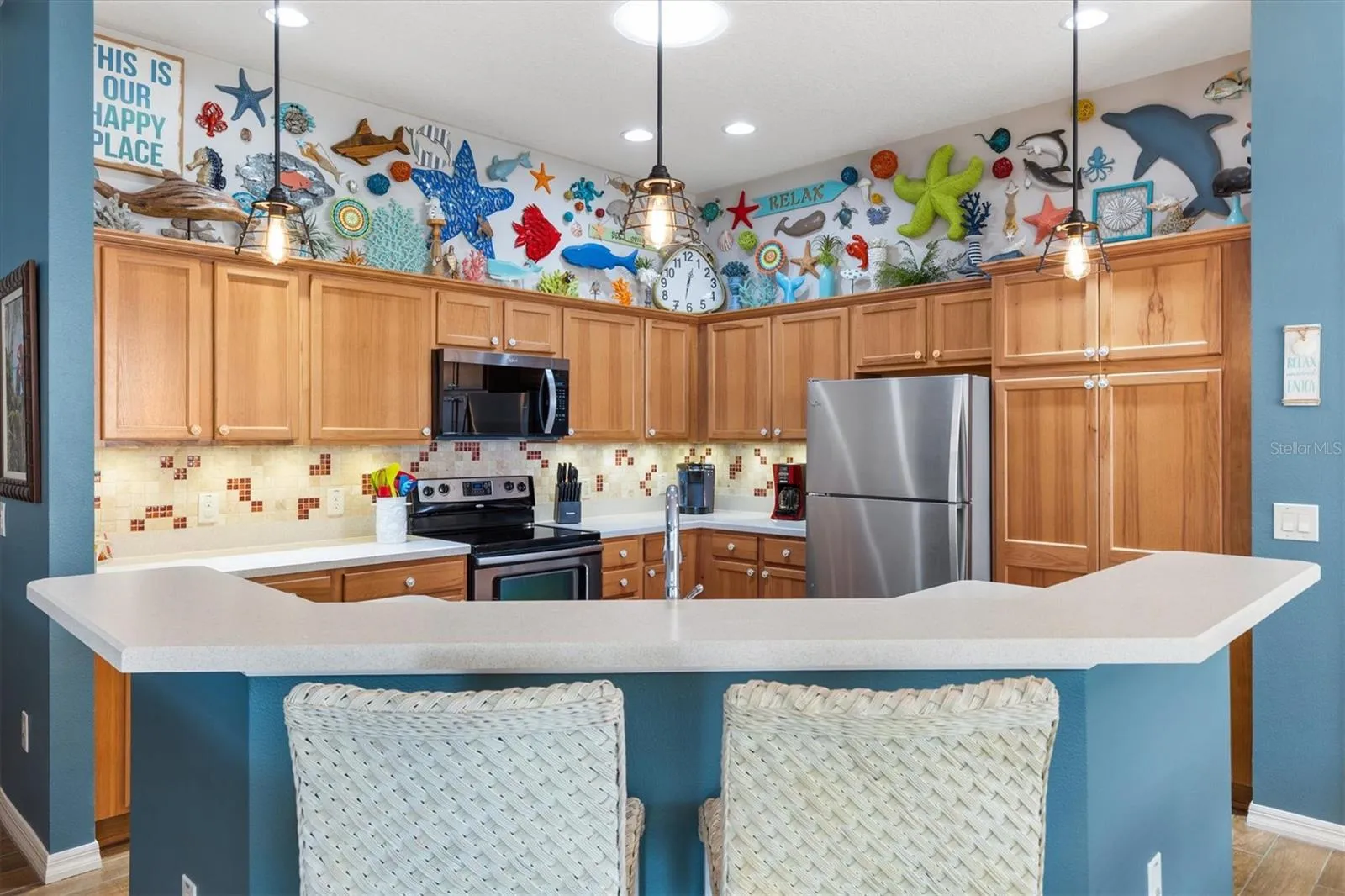 KITCHEN WITH BAR STOOLS