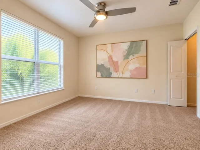 Virtually Staged Bedroom with walk in closet