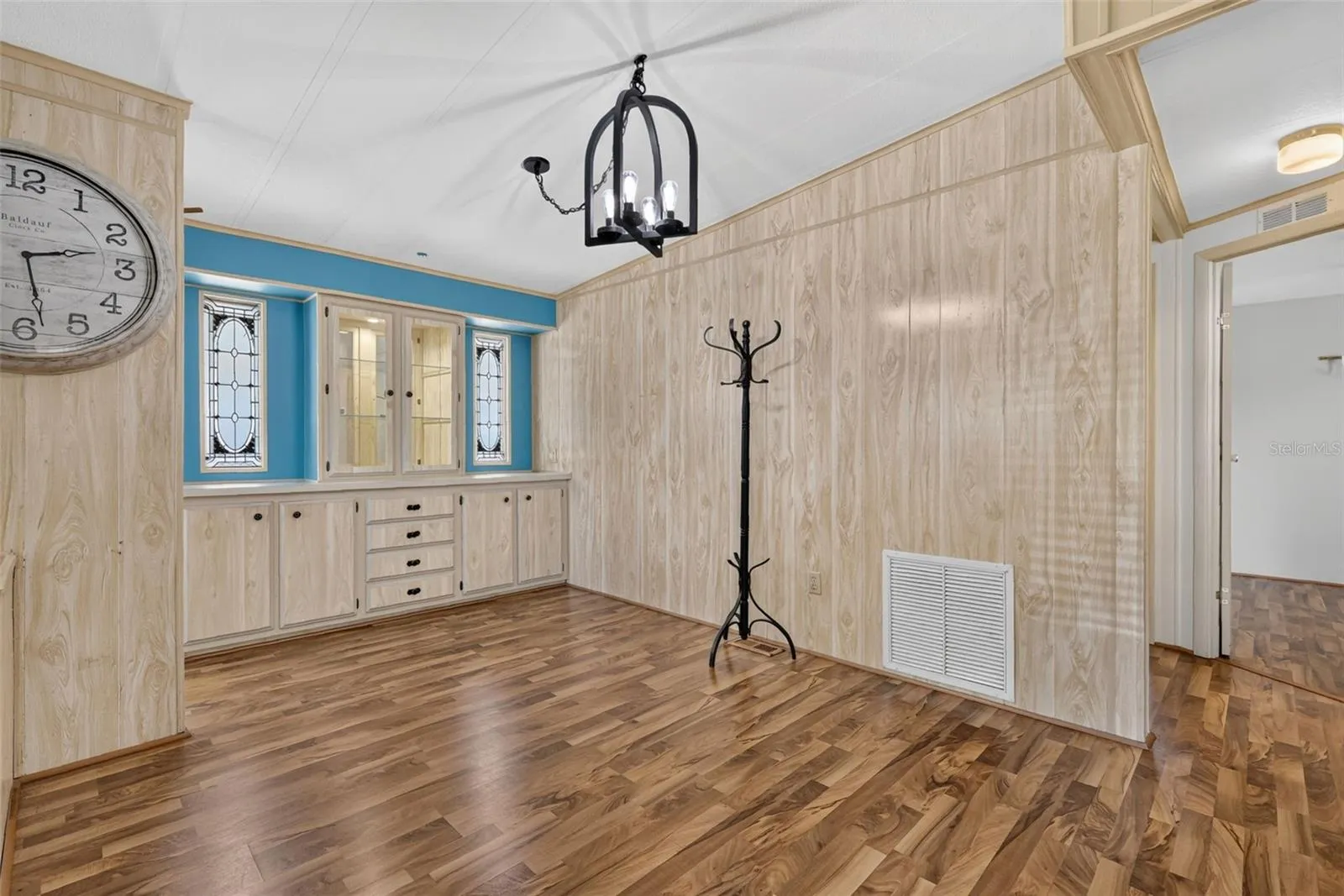 Dining Area with Built in cabinets with lights