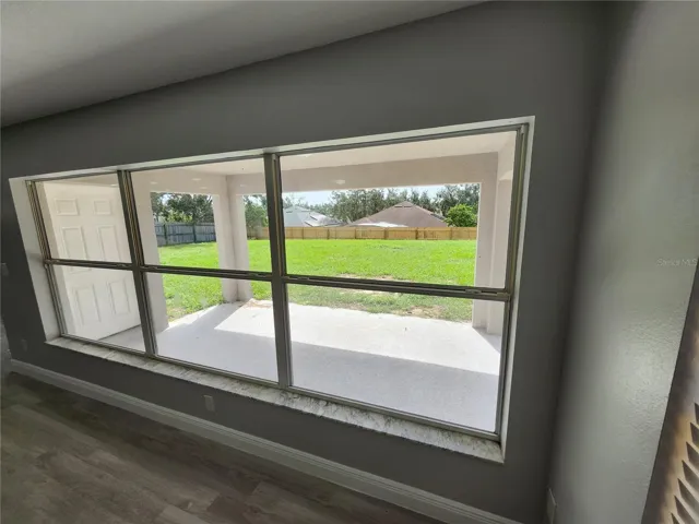 View of fenced backyard