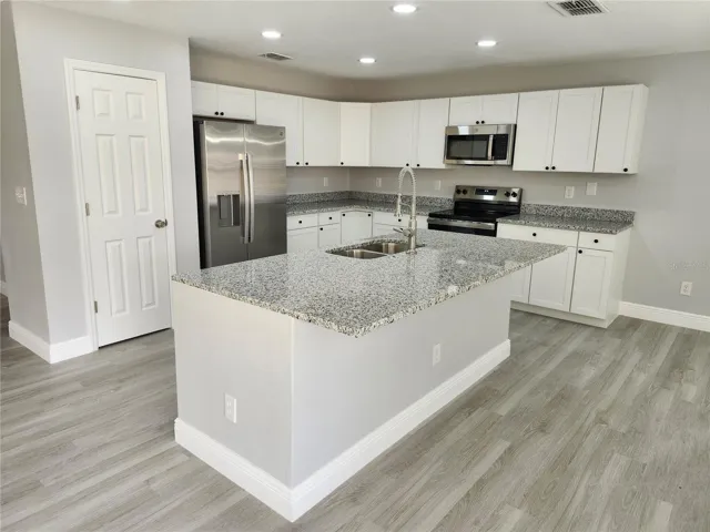 Kitchen with Eat In Bar