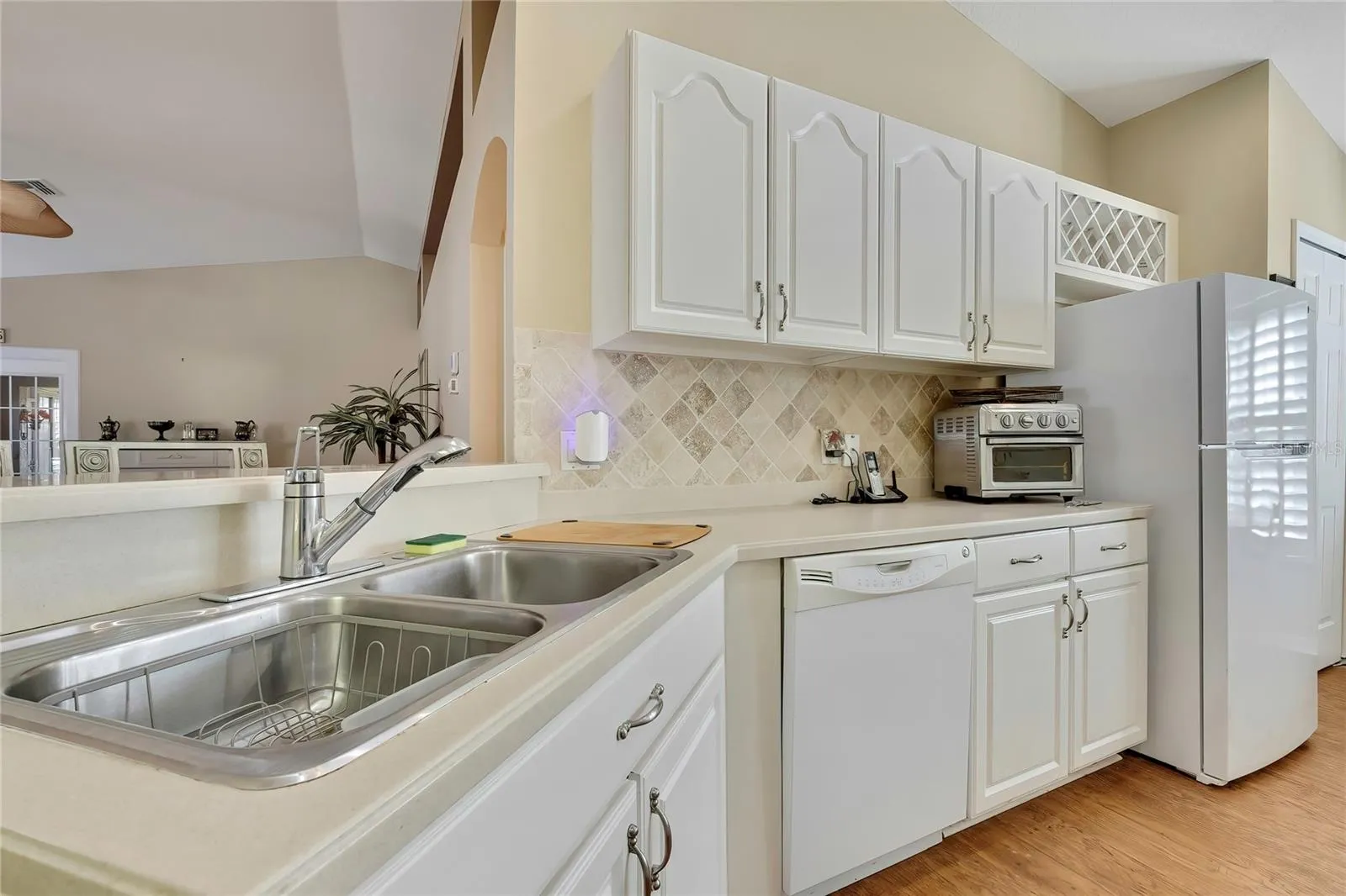 Wood and Glass Cabinets, Corian Counters