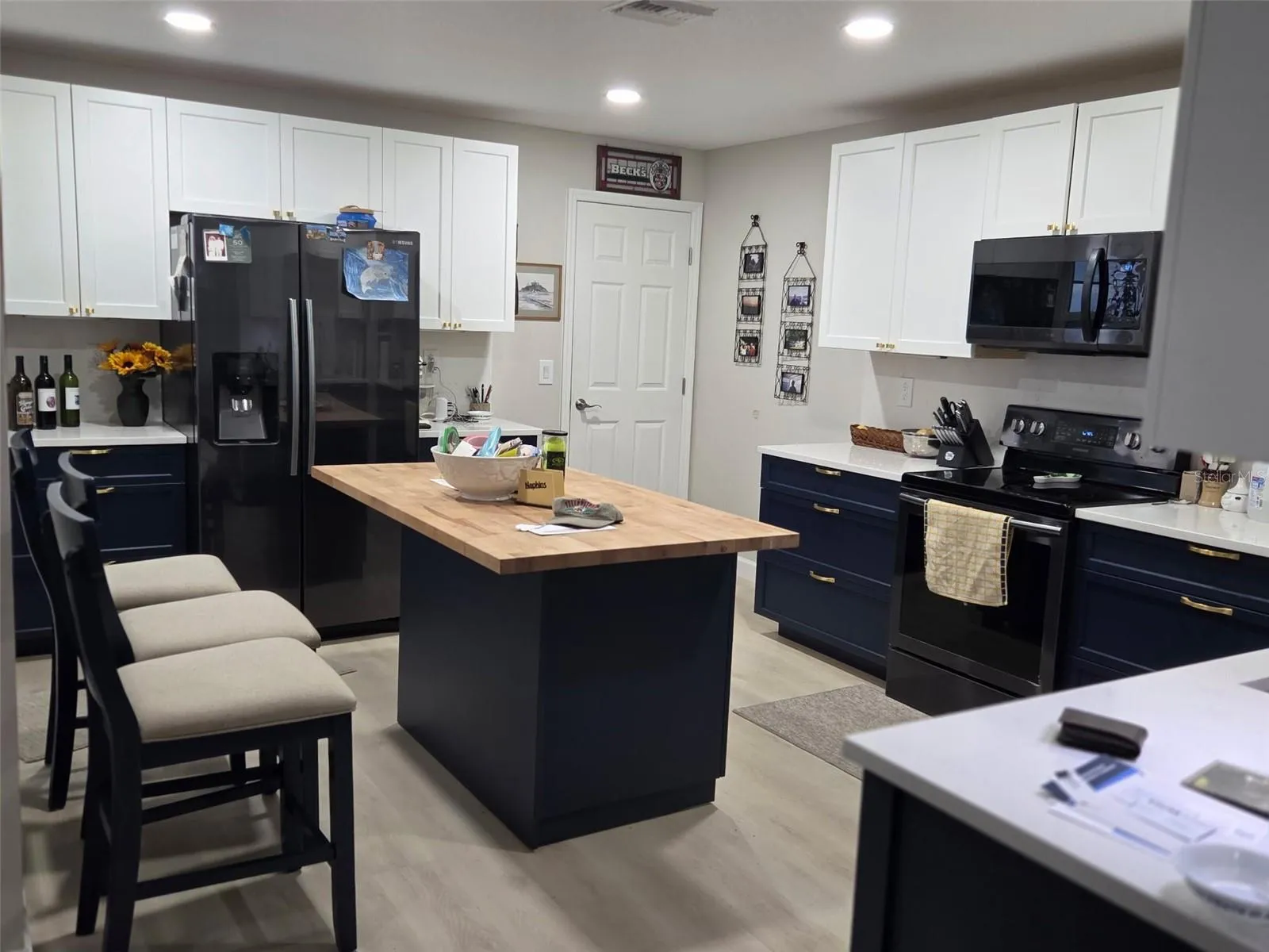 Updated kitchen with 2 toned shaker cabinets