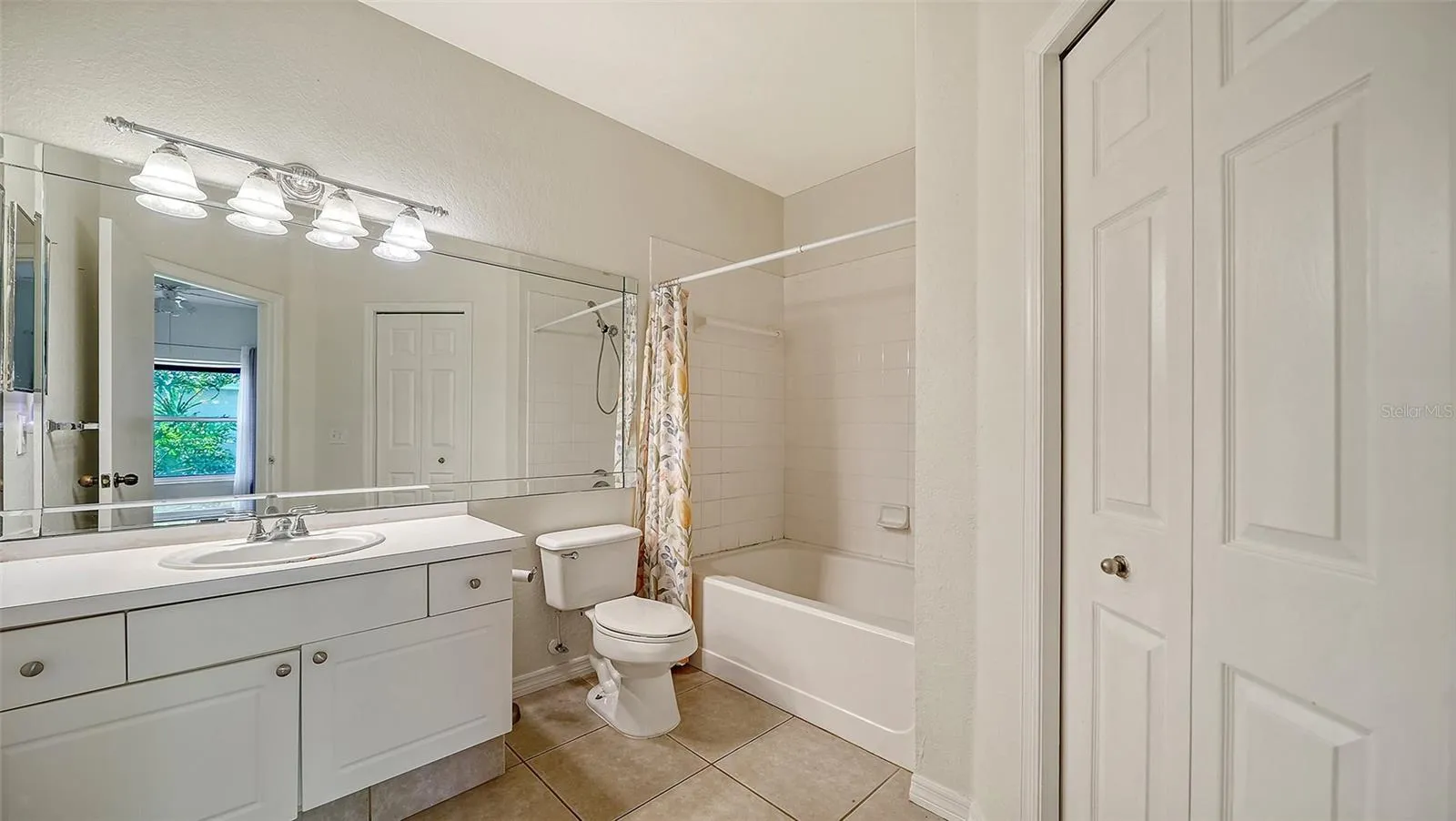 MASTER BATHROOM WITH LINEN CLOSET