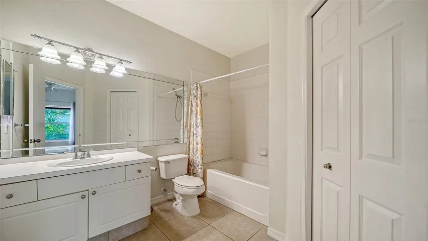 MASTER BATHROOM WITH LINEN CLOSET