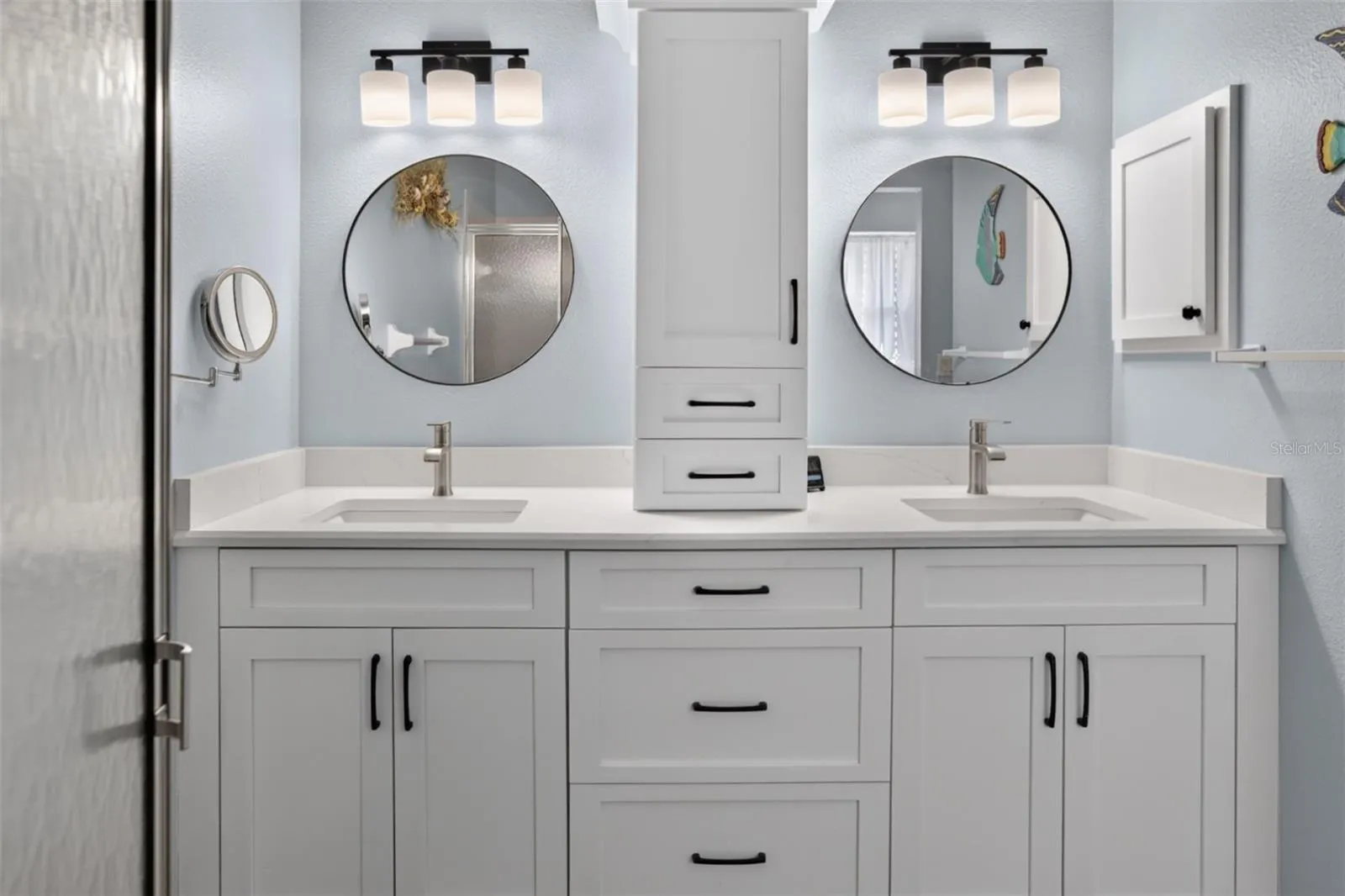 Primary bath- dual sinks with electricity to middle cabinet