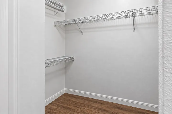 Primary walk in closet 5.0'x7.4'