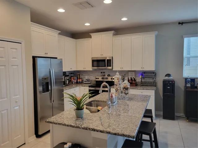 Kitchen with 48" cabinets and granite counters