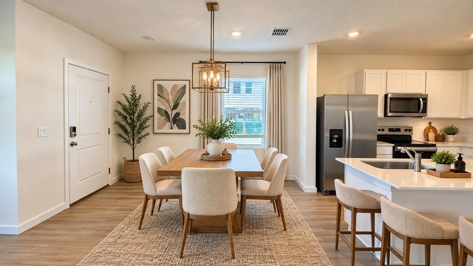 Dining area - virtually staged; offered unfurnished.