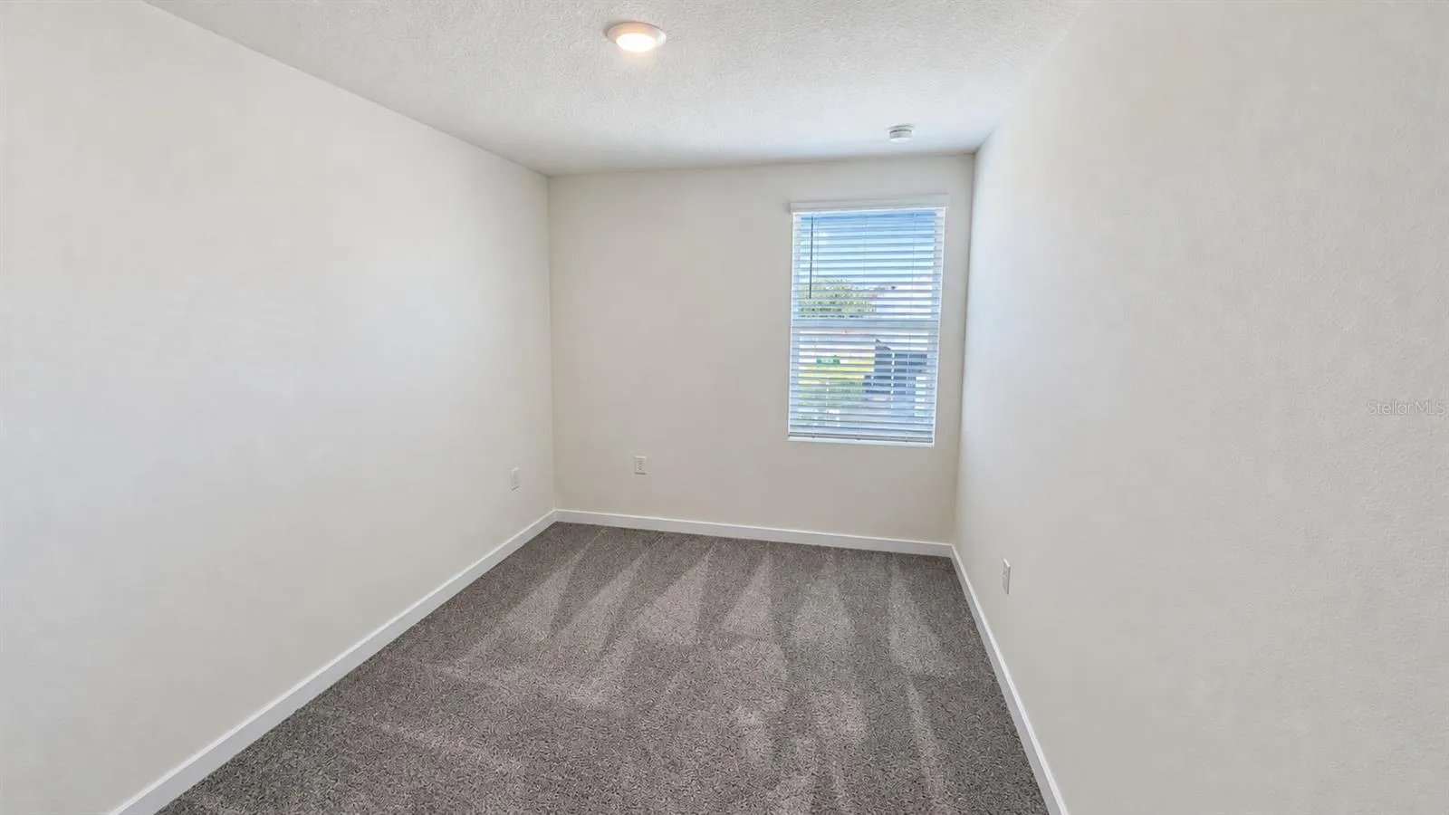 Bedroom 3 - unfurnished; no virtual staging.