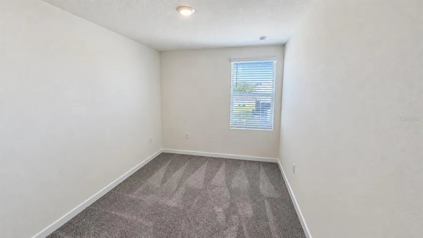 Bedroom 3 - unfurnished; no virtual staging.