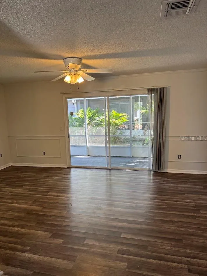 living room with screen porch view