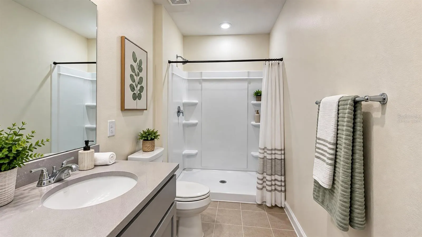 Bathroom vanity and shower - virtually staged decor.