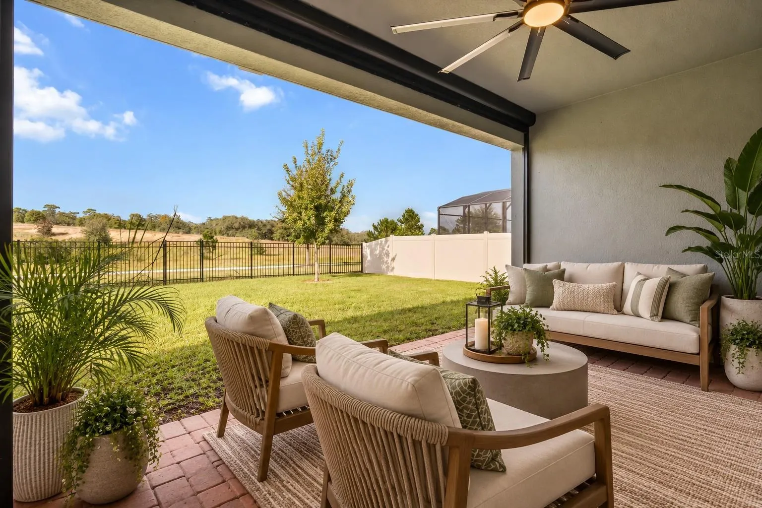 Back lanai with motorized screen