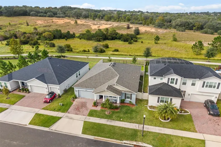 overhead of home backing to greenbelt and walking path to lake