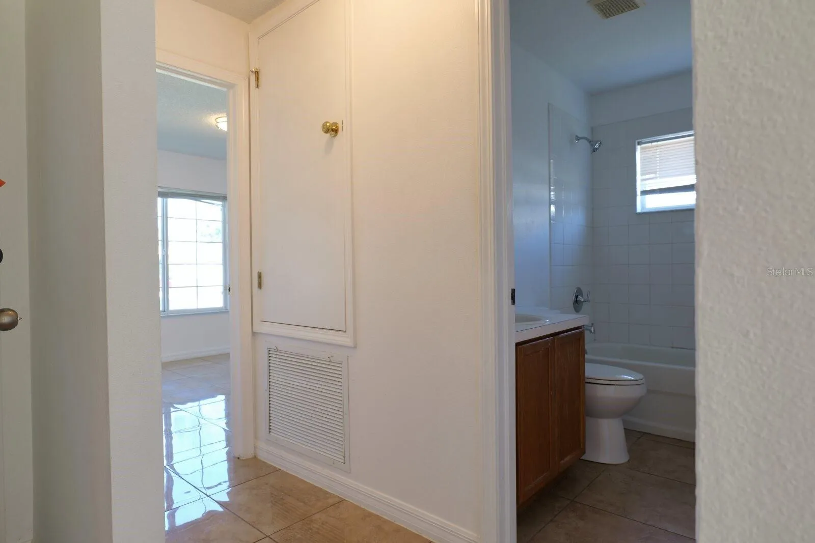 Inviting entrance hallway featuring a bright and welcoming transition into the home.