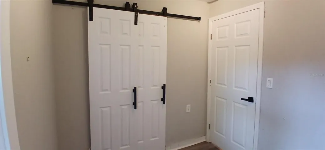 Bedroom 3 with Barn closet doors