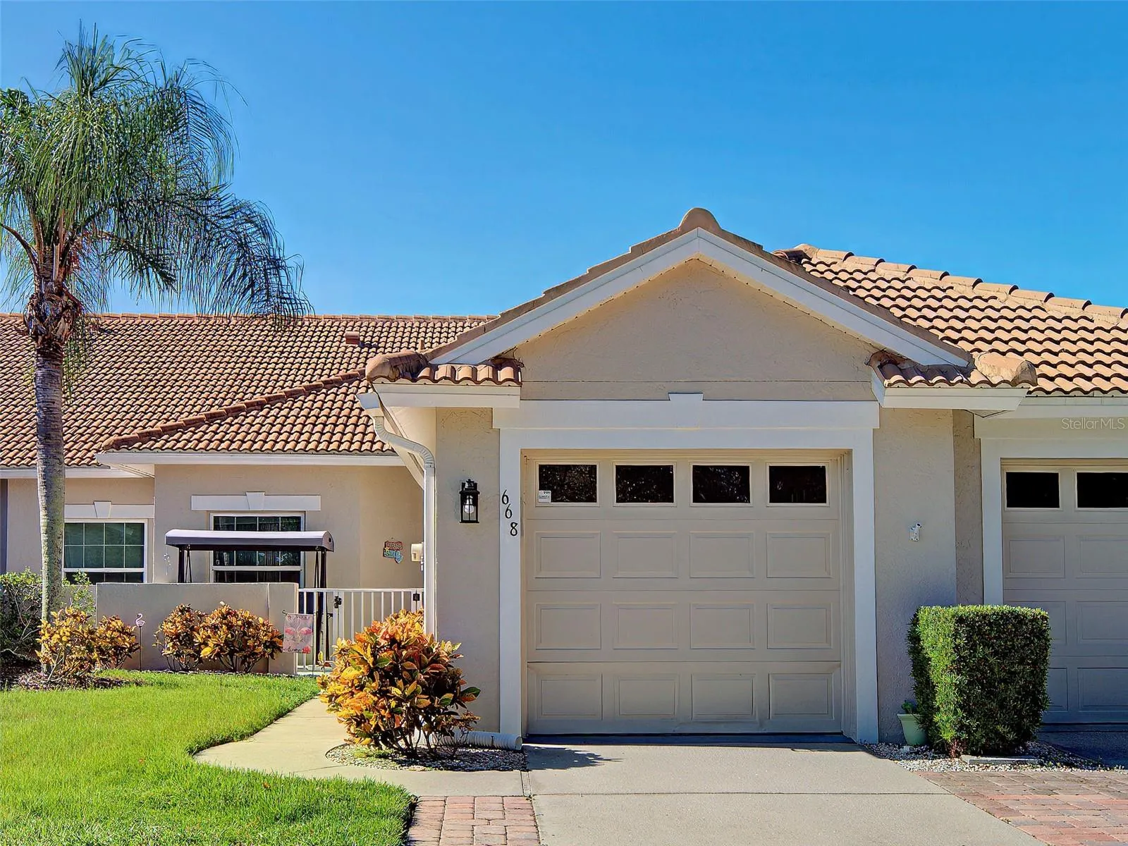Front Entry with gated courtyard.