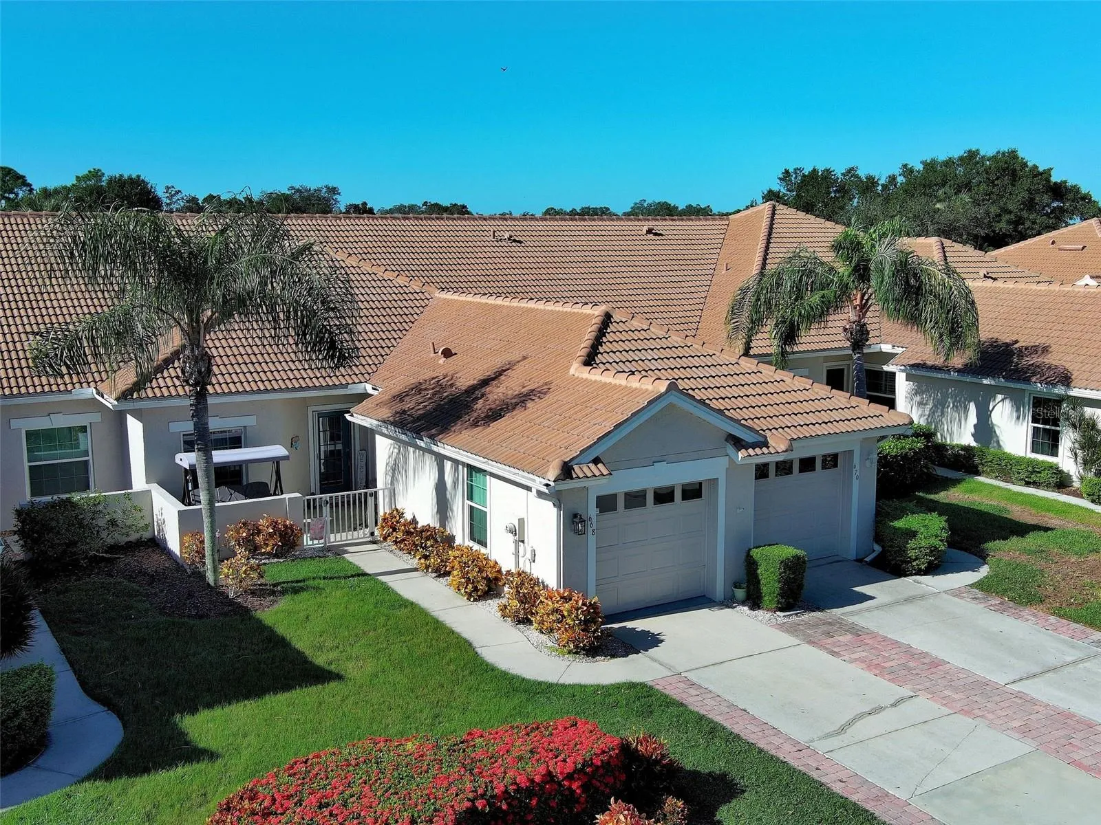 Front of villa with open courtyard area.
