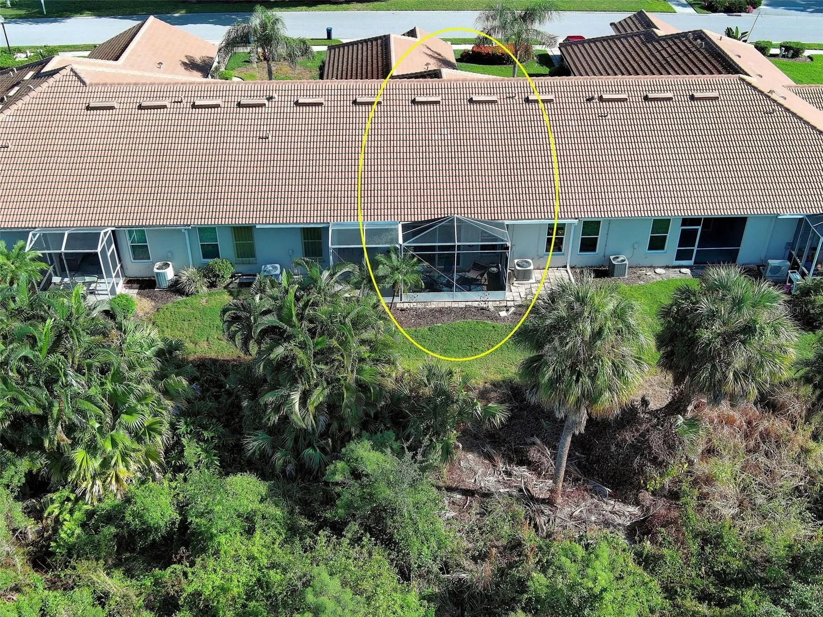 Aerial view of rear - this unit has a larger than most screened in lanai.
