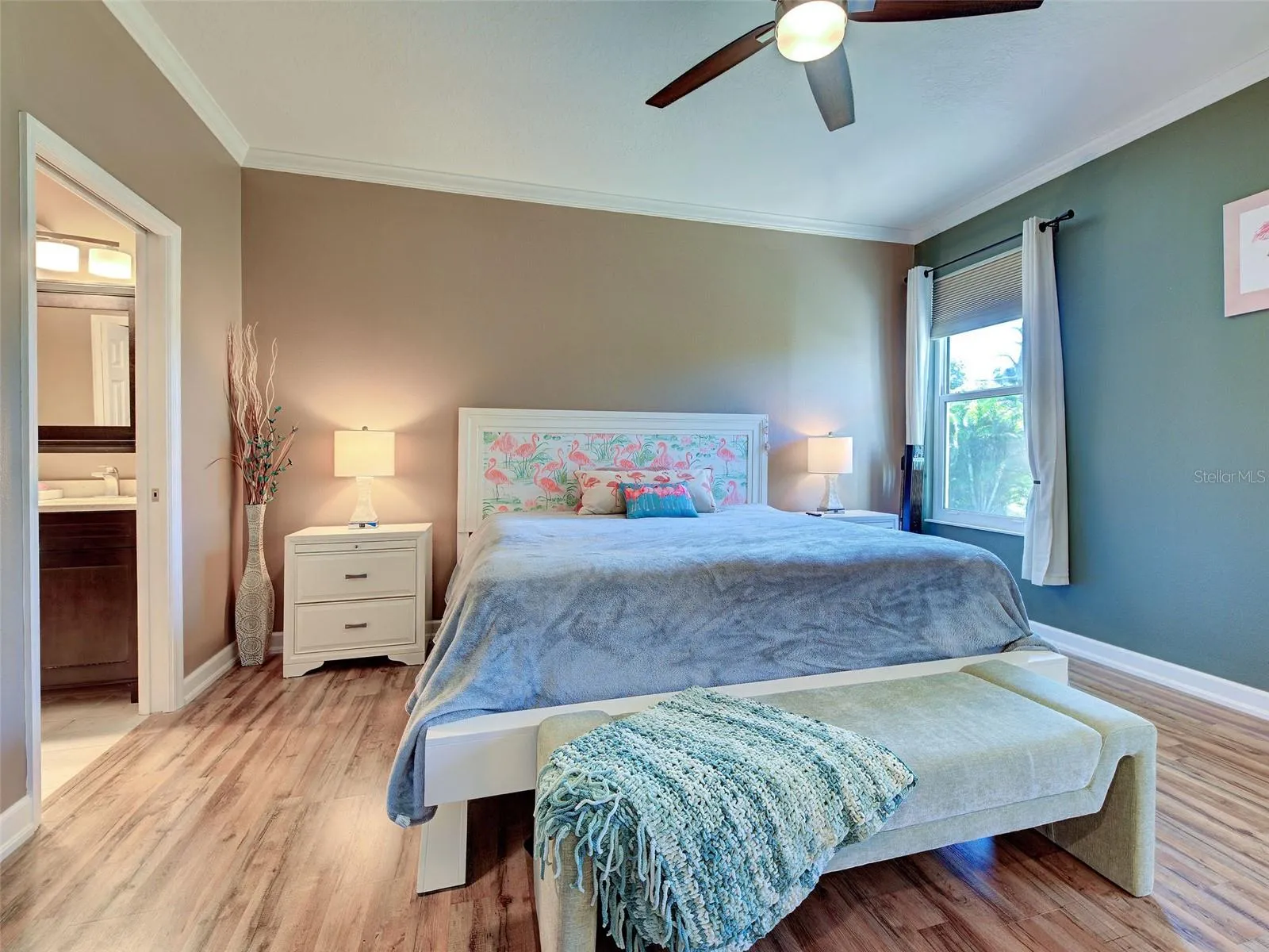 Roomy Primary Bedroom with huge walk-in closet and organizers.
