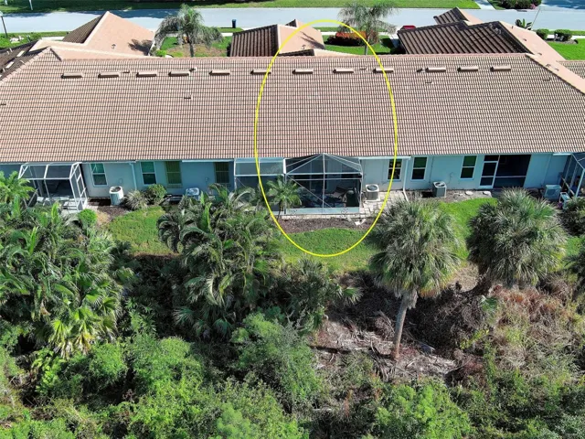 Aerial view of rear - this unit has a larger than most screened in lanai.