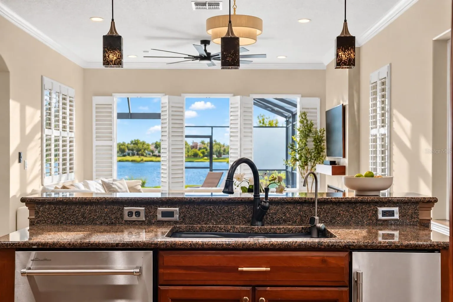 Kitchen island with sink overlooking the waterviews