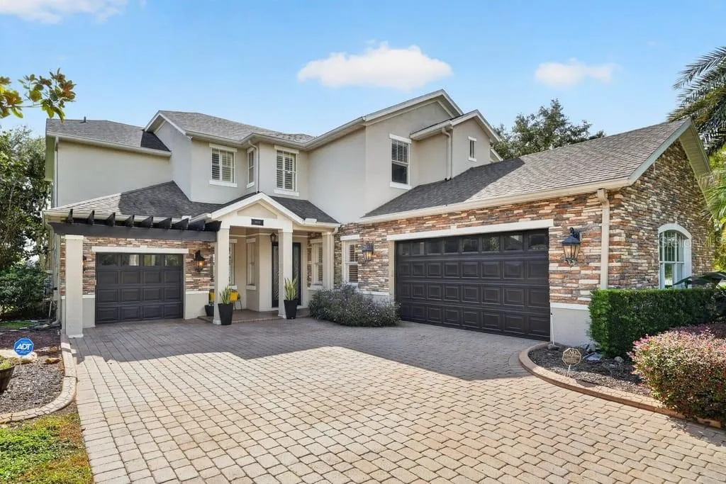 Stunning home with fresh interior and exterior paint, new roof and over $70k in recent improvements