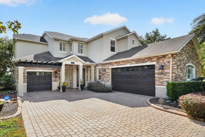 Stunning home with fresh interior and exterior paint, new roof and over $70k in recent improvements