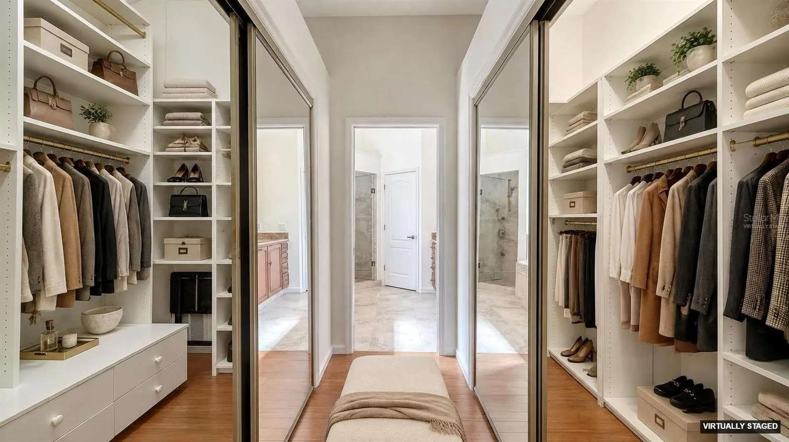 Virtually staged primary bedroom walk in closets