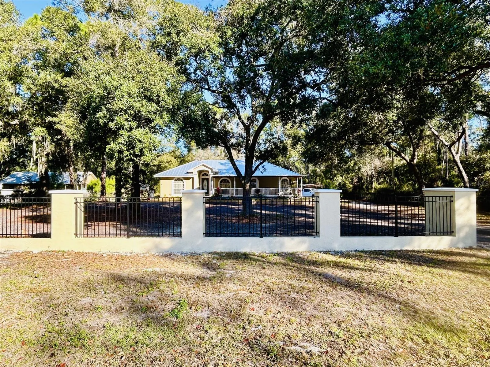Front Entry & Decorative Fencing