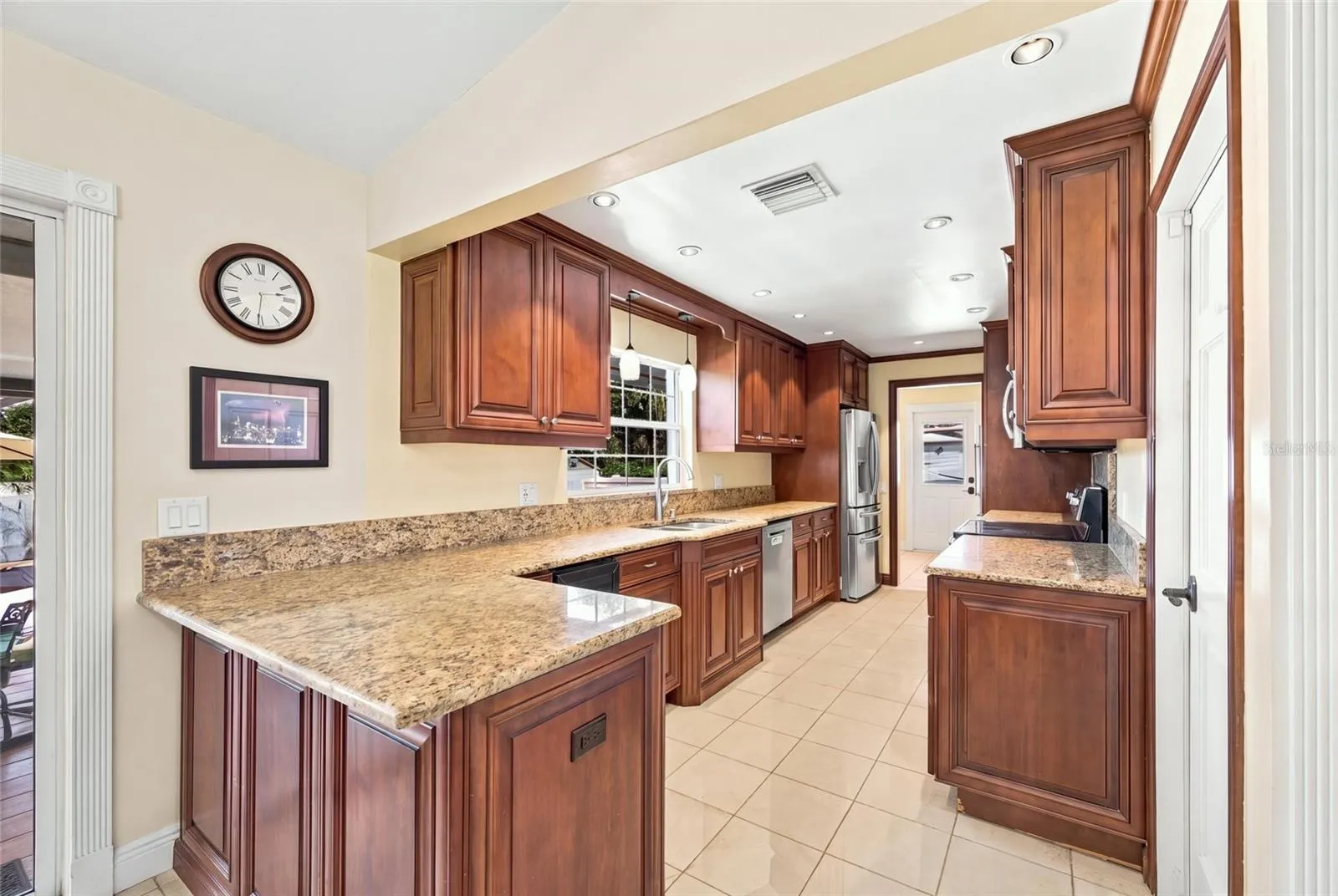 Kitchen with granite counters &amp; wine cooler