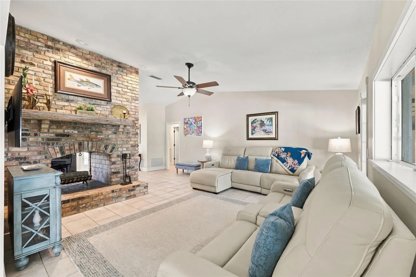 Family room with wood burning fireplace
