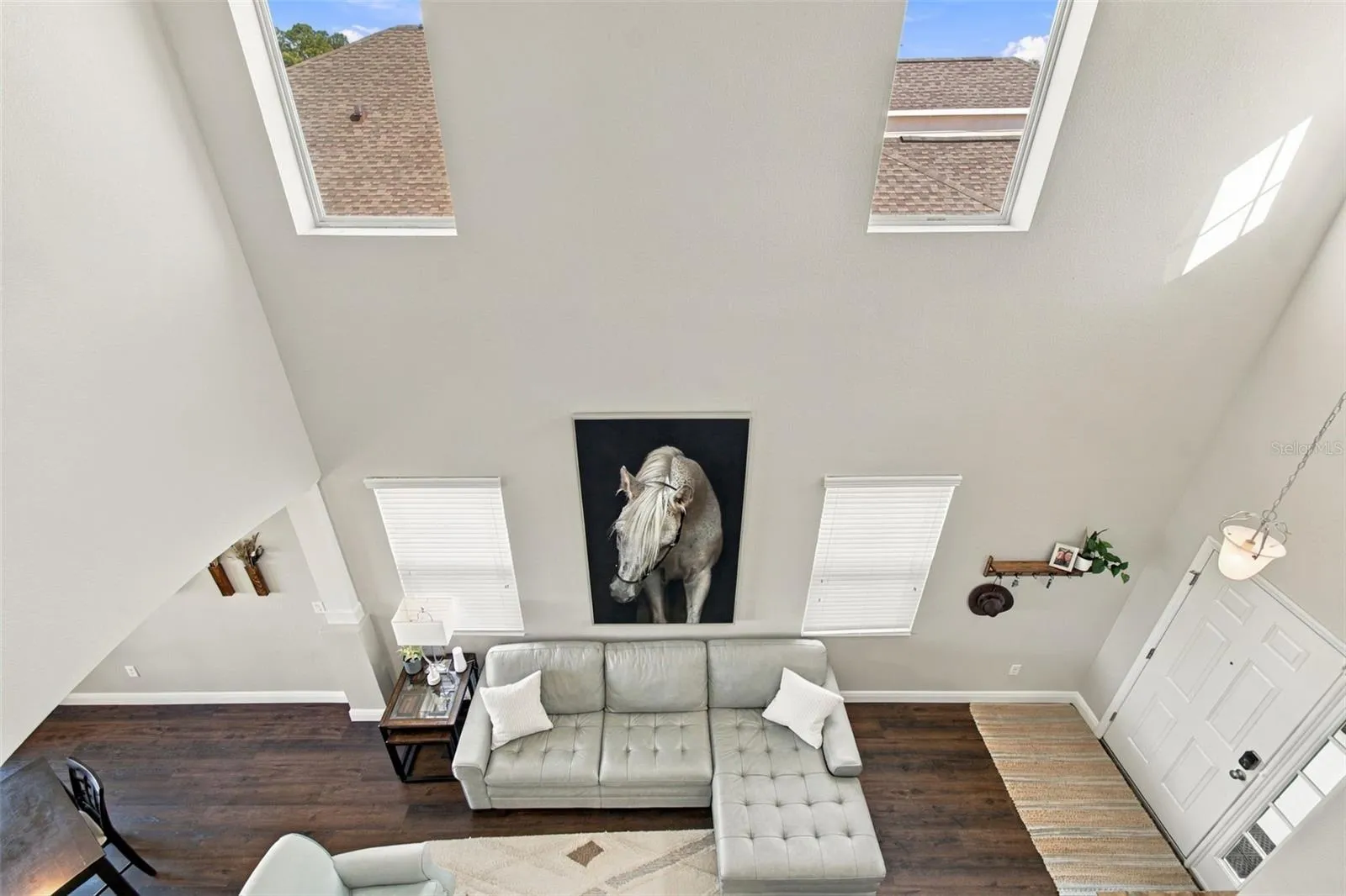 View down to living room and entry
