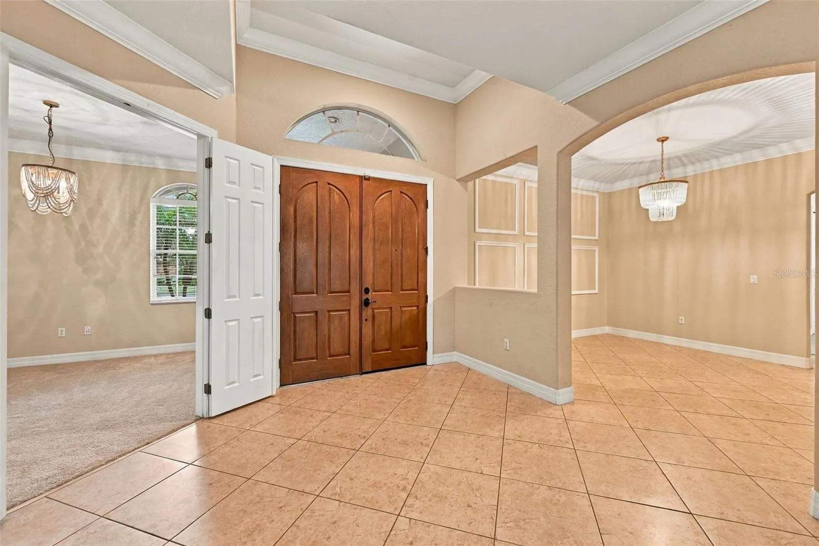 Entrance (Office/Den to the left and Formal Dining Room to the right)