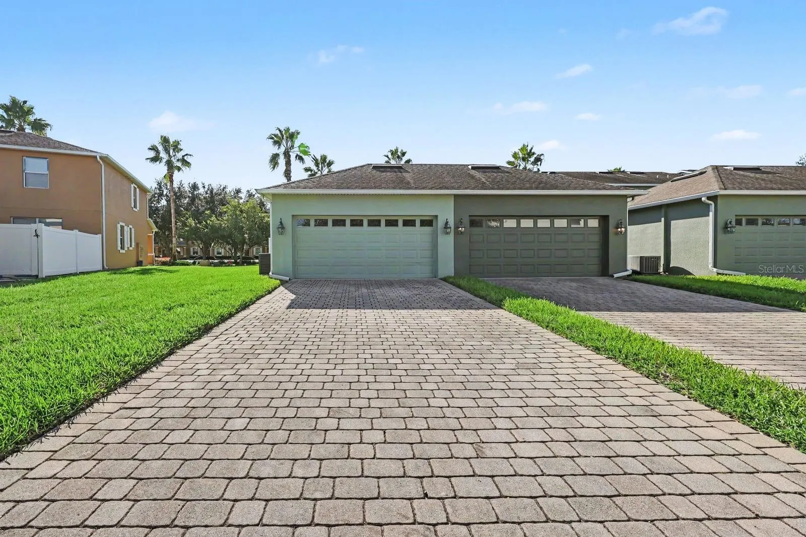 Charming Home with Two-Car Garage and Paver Driveway