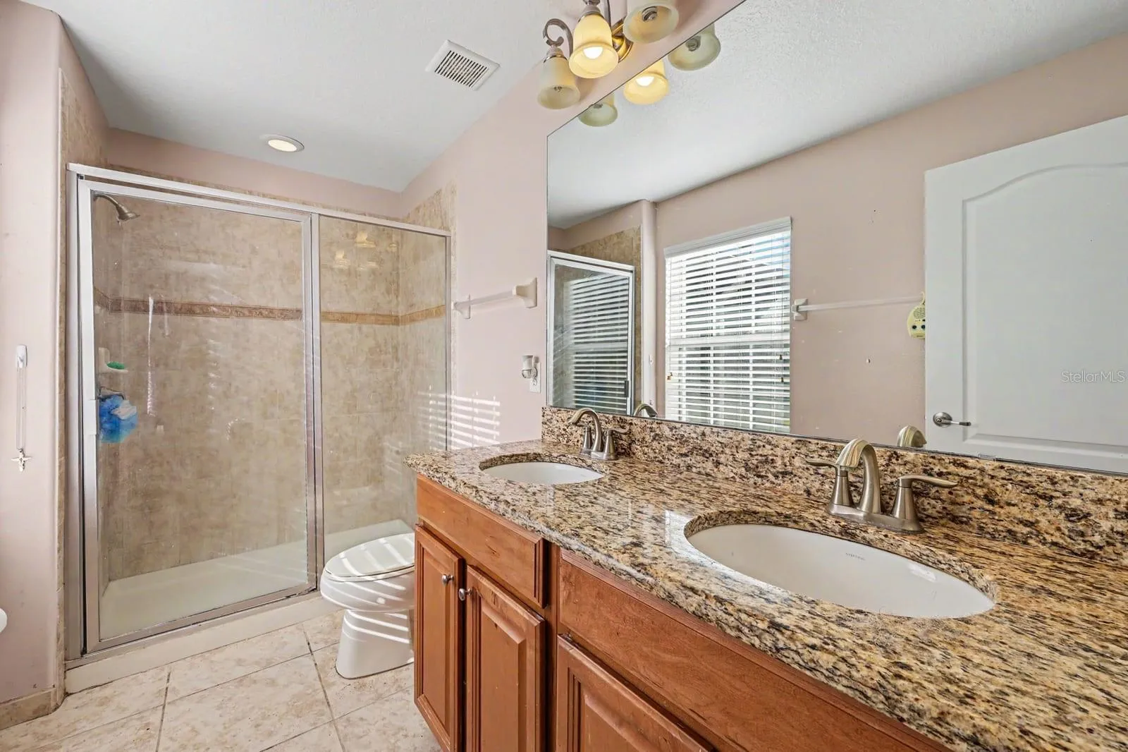 Spa-like Master Bath with Dual Vanities, Granite Countertops &amp; Spacious Walk-In Shower