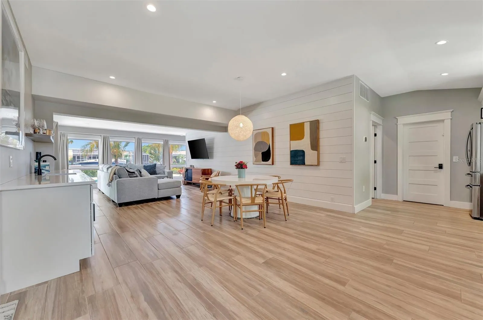 Updated mid-century home with 3 bedrooms, 3 bathrooms, and inviting indoor-outdoor living.