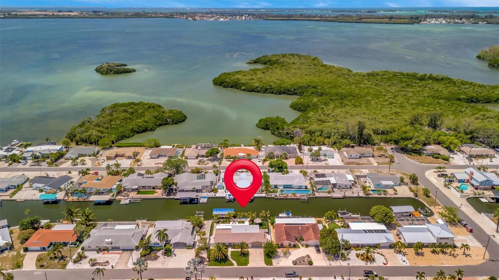 Near Palma Sola Causeway Park, with convenient access to Bradenton and Sarasota shopping, dining, and amenities.